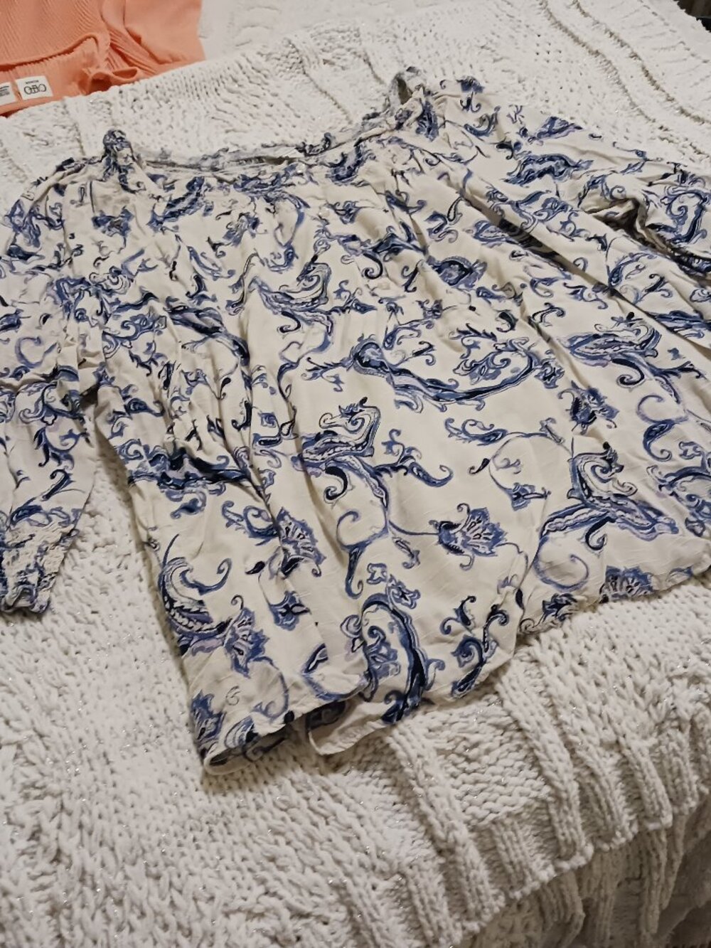 Cato top, cream with blue detailing.  It is a size 18/20